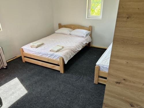 Postel nebo postele na pokoji v ubytování Šumska kuća Ilija