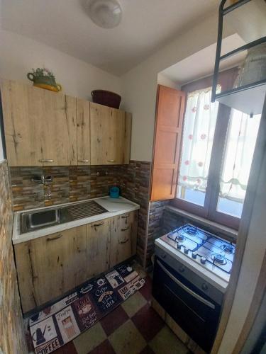 Kuchyň nebo kuchyňský kout v ubytování "Il Quercione" Casa vacanze