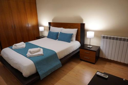 Posteľ alebo postele v izbe v ubytovaní Vivenda Portela