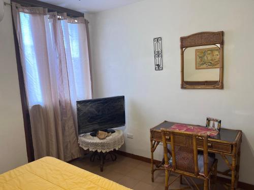 TV a/nebo společenská místnost v ubytování Departamento relax Ambassador