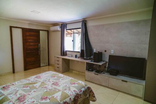 TV a/nebo společenská místnost v ubytování Casa com Wi-Fi a 200m da Praia do Coqueiro PI