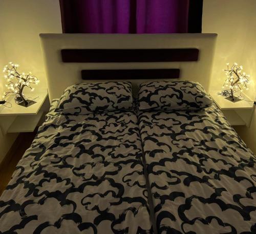 Łóżko lub łóżka w pokoju w obiekcie Apartment YESA