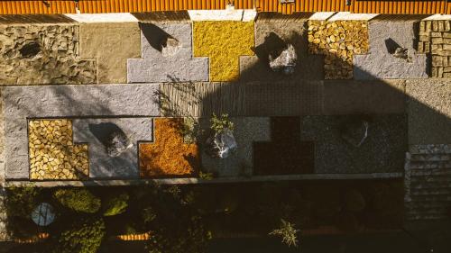 a shadow of a person on a wall at Bellacya Resort & Spa in Sovata