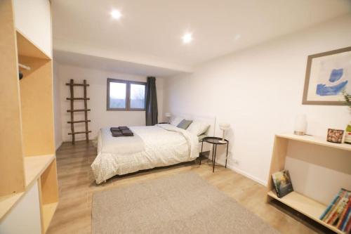 Ein Bett oder Betten in einem Zimmer der Unterkunft Cosy Chalet Vue & Nature Durbuy