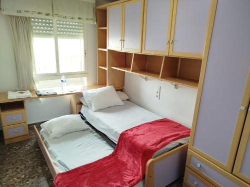 Llit o llits en una habitació de Ushuaia