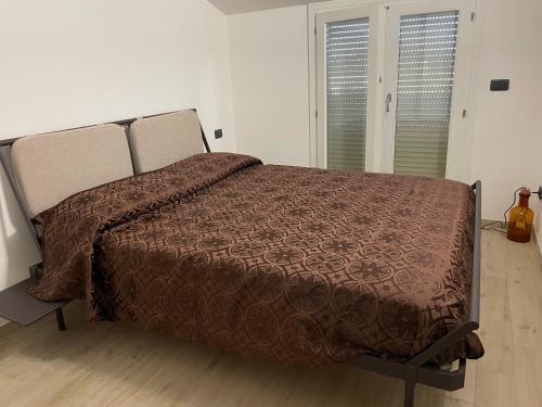 Ένα ή περισσότερα κρεβάτια σε δωμάτιο στο Guillermo House