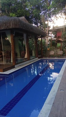 Kolam renang di atau dekat dengan Pousada Casa de Sapê
