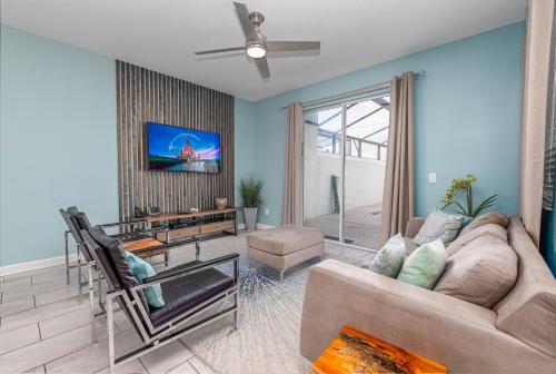 a living room with a couch and a table at MVP-4967WA SL townhouse in Kissimmee