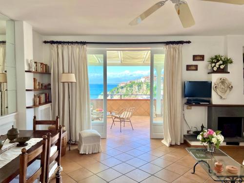 a living room with a view of the ocean at Cilento Rooftop in Agropoli