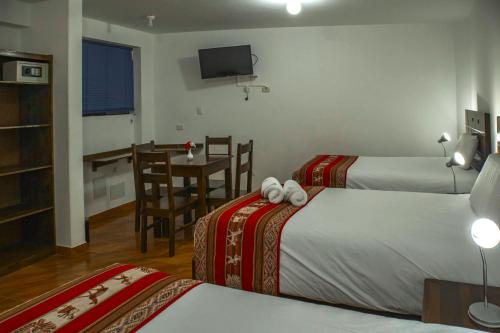 Katil atau katil-katil dalam bilik di Hotel Del Prado Hometown