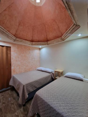 Katil atau katil-katil dalam bilik di Central Hostel Boutique