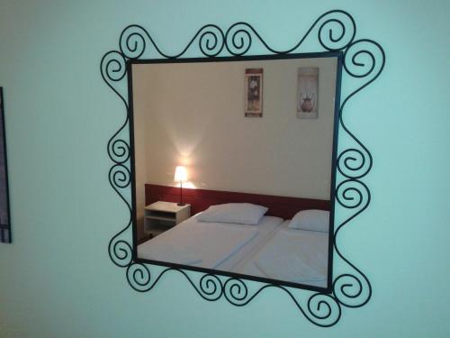 Postel nebo postele na pokoji v ubytování Bed Breakfast Hotel Budapest