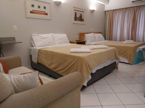 Una cama o camas en una habitación de Flat in Allianz Parque com estacionamento