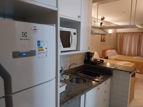 Una cocina o kitchenette en Flat in Allianz Parque com estacionamento
