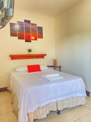 Postel nebo postele na pokoji v ubytování Hostal San José