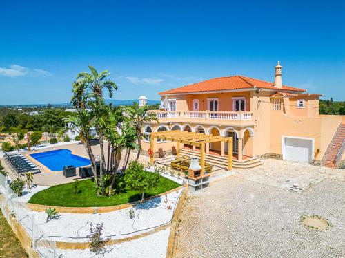 an aerial view of a house with a pool at Solar dos Gandums by Atlantic Places in Pêra