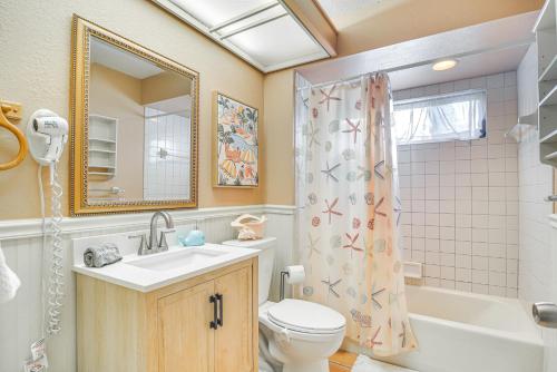 a bathroom with a sink and a toilet and a shower at Prime Largo Vacation Rental with Lanai and Pool! in Largo