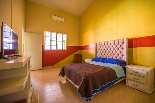 Кровать или кровати в номере Hermosa Casa con Alberca 1 Habitación