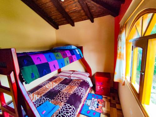 Postel nebo postele na pokoji v ubytování Hostal El Inca