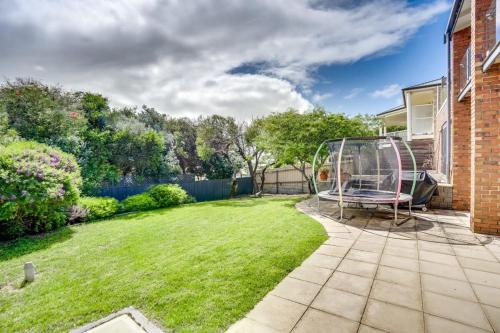a garden with a gazebo in the yard at 20 Sir George Ritchie Ave Goolwa South - No Linen Included in Goolwa South