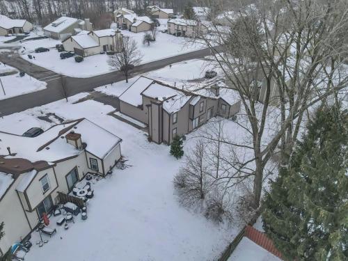 an aerial view of a snow covered neighborhood at Housepitality - The Gahanna Hideaway in Gahanna