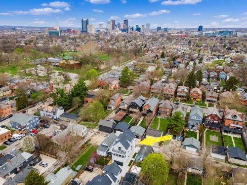 an aerial view of a residential neighborhood with a city at Chateau in the Village - Brand New 3BD 5BA in Columbus