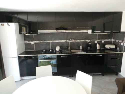 Dapur atau dapur kecil di Appartement Vue Montagne