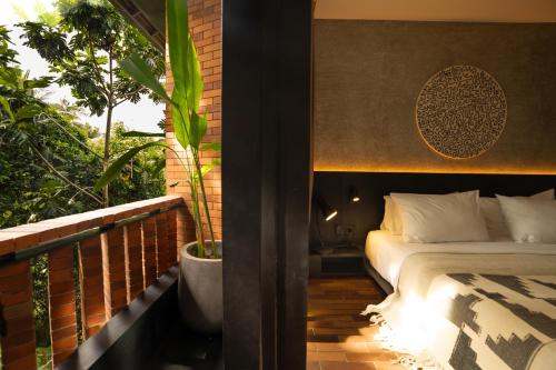 Cama o camas de una habitación en Titik Dua