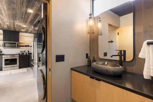 a bathroom with a counter with a sink in it at Zion loft with canyon views - unit 2 in Springdale