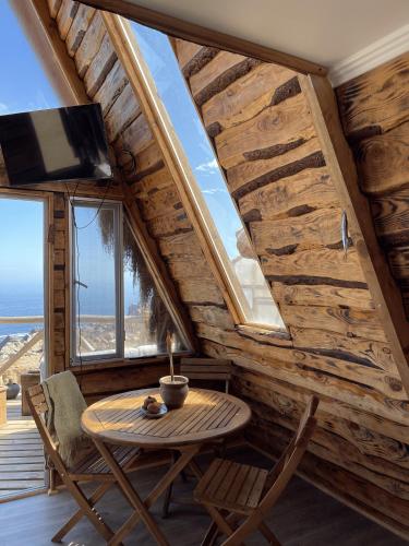 TV a/nebo společenská místnost v ubytování Eco Lodge La Ola Oculta