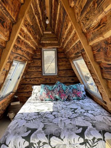 Postel nebo postele na pokoji v ubytování Eco Lodge La Ola Oculta