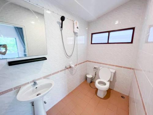 a white bathroom with a sink and a toilet at Prime Hill , Kathu Phuket / E2 in Phuket Town