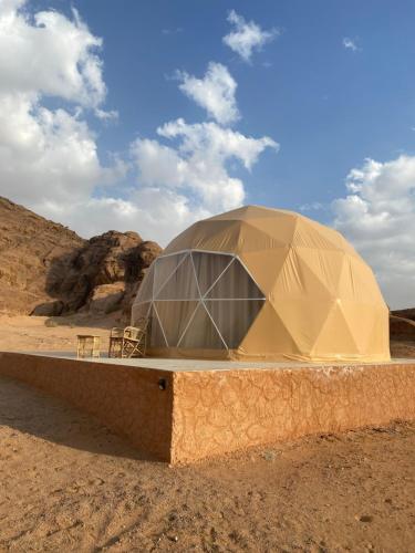 a dome tent in the middle of the desert at Moon Rum LuxuryCamp in Wadi Rum