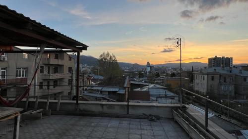 a view of a city from the roof of a building at Garden House Tbilisi in Tbilisi City