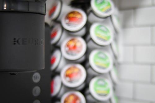 a close up of a bunch of stickers on a wall at Serene Condo W/ LED Lights In Heart Of Raleigh in Raleigh