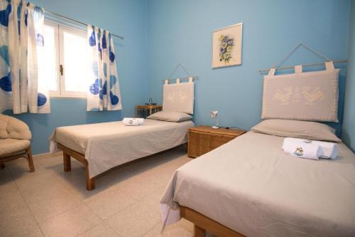 Ліжко або ліжка в номері A12-Masseria Villa Gandoli-Piscina
