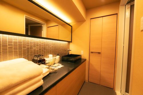 Koupelna v ubytování MolinHotels702 アクティビティを満喫できる札幌定山渓 天然温泉付-1L2Room K-Bed1&W-beds3 8persons