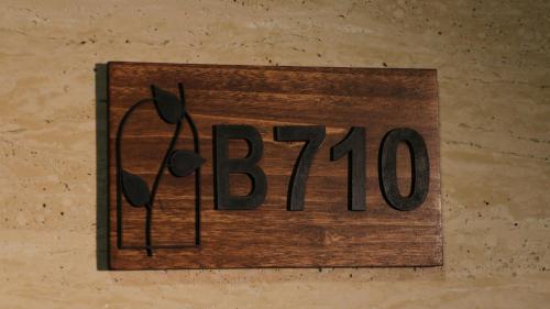a sign that says hanging on a wall at Tilia Hotel Beirut in Beirut