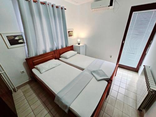 Postel nebo postele na pokoji v ubytování Bravo Plus