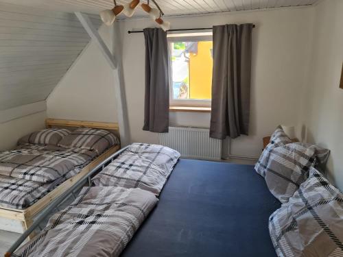 Posteľ alebo postele v izbe v ubytovaní Pavlinka Cottage - HOT TUB - SAUNA