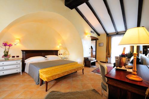 Posteľ alebo postele v izbe v ubytovaní Hotel Arbatasar
