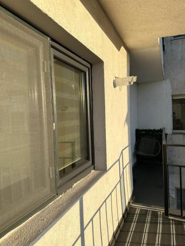 a window on the side of a building at CassaTa-one-Vaslui in Vaslui