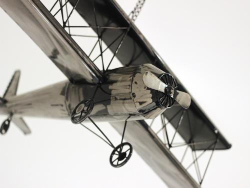 a small airplane flying in the sky at L'Etoile in Foggia