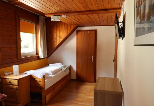 Postel nebo postele na pokoji v ubytování Sonntagshof Ferienwohnungen Apartments