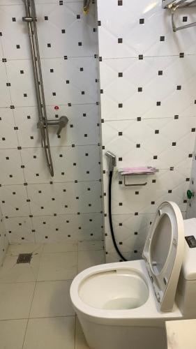 Un baño de 老骆西港宾馆