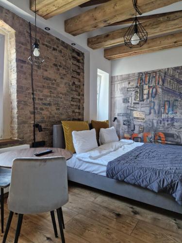 Postel nebo postele na pokoji v ubytování Aparthotel Krzywa