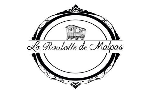a roundtable de marias sign with a drawing of a truck at La Roulotte deluxe de Malpas in Quingey