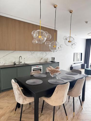 Dapur atau dapur kecil di Three-Room Apartments with Terrace, SPA and Tennis court