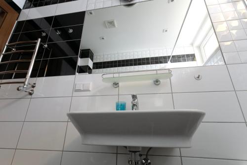 Ett badrum på Cozy apartments in Bulduri
