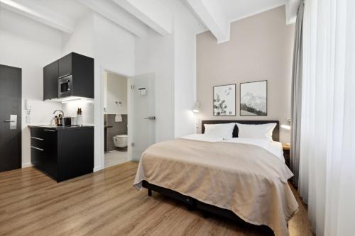 Katil atau katil-katil dalam bilik di Limehome Munich Fritz-Erler Str